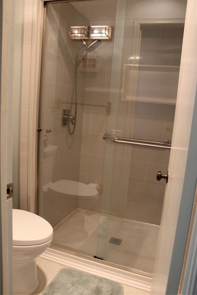 1424 Valley Trl, Mesquite, TX 75149 - bathroom with toilet and a shower stall