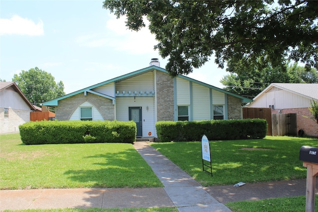 1424 Valley Trl, Mesquite, TX 75149 - mid-century home with a chimney and brick siding