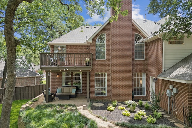 726 Nettleton Dr, Southlake, TX 76092 - rear view of property featuring a balcony, outdoor lounge area, a chimney, and a shingled roof