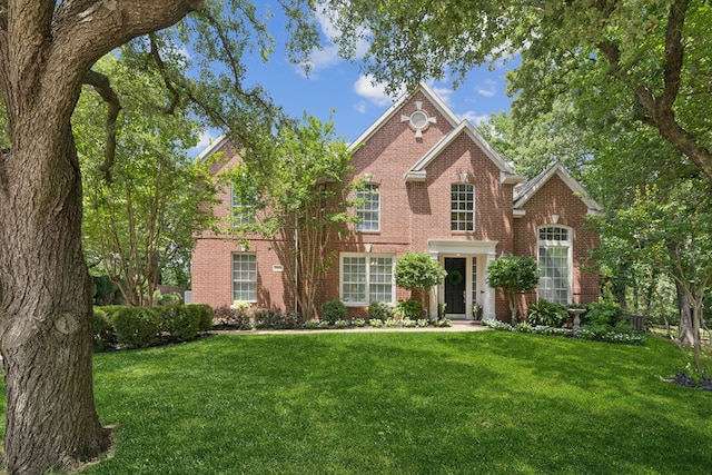 726 Nettleton Dr, Southlake, TX 76092 - georgian-style home featuring a front yard and brick siding