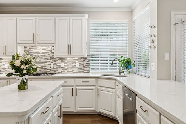 726 Nettleton Dr, Southlake, TX 76092 - kitchen featuring a sink, stainless steel dishwasher, white cabinets, backsplash, and ornamental molding