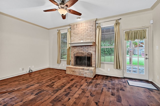 2004 Monte Cristo Dr, Sherman, TX 75092 - unfurnished living room featuring hardwood / wood-style flooring, ceiling fan, crown molding, and a brick fireplace
