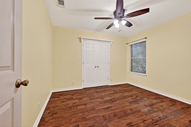 2004 Monte Cristo Dr, Sherman, TX 75092 - unfurnished bedroom with dark wood finished floors and ceiling fan