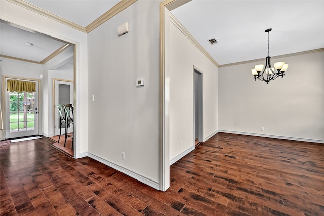 2004 Monte Cristo Dr, Sherman, TX 75092 - unfurnished room featuring ornamental molding, dark wood-style floors, and a chandelier