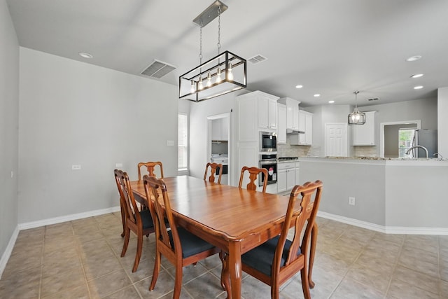 14877 Snowshill Dr, Frisco, TX 75035 - dining room featuring recessed lighting, baseboards, and light tile patterned floors