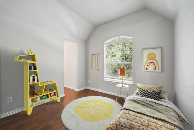 14877 Snowshill Dr, Frisco, TX 75035 - bedroom featuring wood finished floors, lofted ceiling, and baseboards