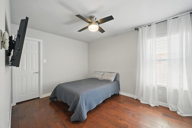 14877 Snowshill Dr, Frisco, TX 75035 - bedroom featuring hardwood / wood-style flooring, baseboards, and a ceiling fan