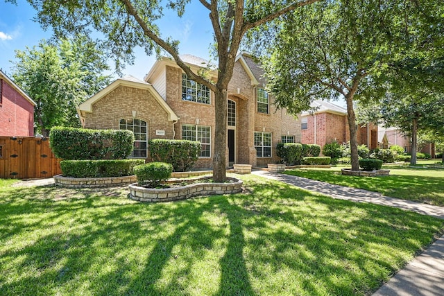 14877 Snowshill Dr, Frisco, TX 75035 - traditional home featuring brick siding and a gate