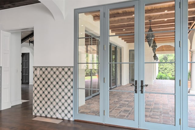 4400 Belfort Pl, Highland Park, TX 75205 - doorway to outside with beam ceiling, french doors, arched walkways, and dark wood-style floors