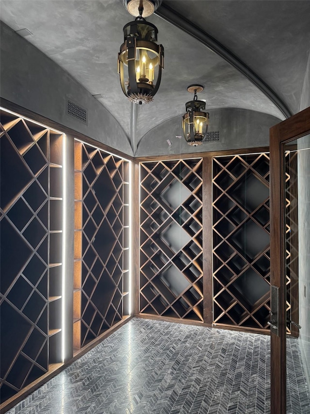 4400 Belfort Pl, Highland Park, TX 75205 - wine area with a chandelier