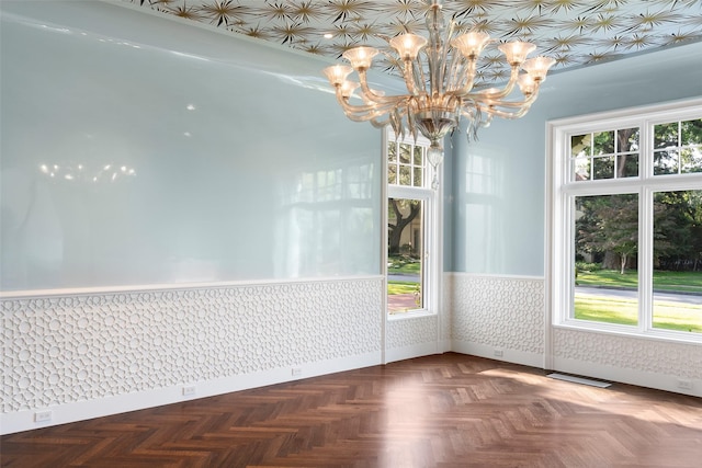 4400 Belfort Pl, Highland Park, TX 75205 - unfurnished dining area featuring a chandelier, wainscoting, and wallpapered walls