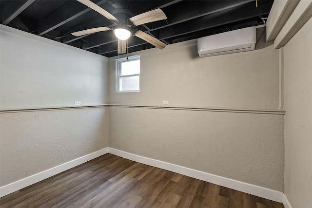 147 Carolynn Rd, Mabank, TX 75156 - basement featuring a wall mounted air conditioner, baseboards, wood finished floors, and a textured wall