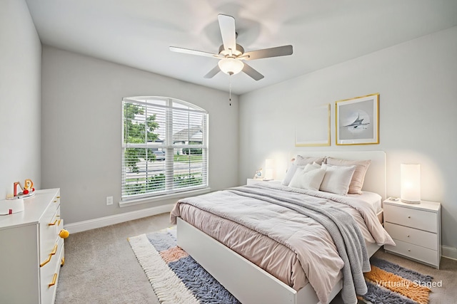 129 Braves Way, Lavon, TX 75166 - bedroom featuring light colored carpet, baseboards, and ceiling fan