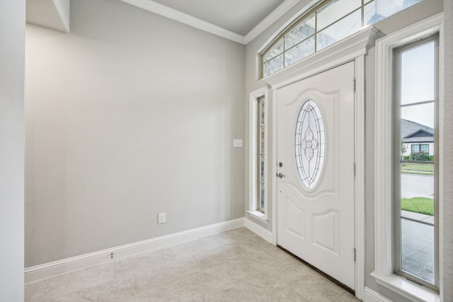 129 Braves Way, Lavon, TX 75166 - foyer entrance featuring ornamental molding, baseboards, and light tile patterned floors