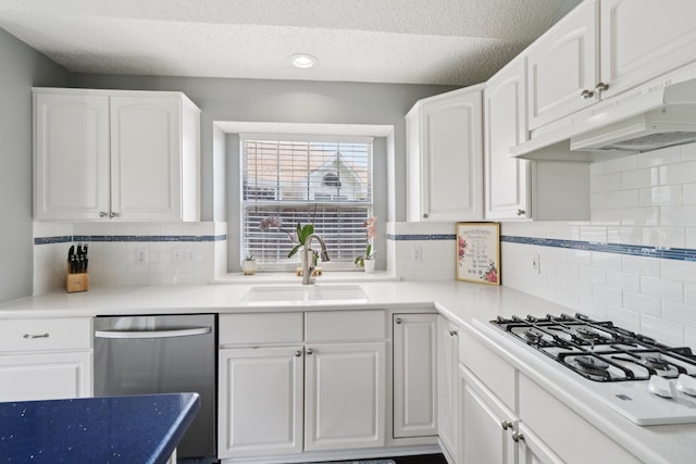 7314 Glenstone St, Rowlett, TX 75089 - kitchen with stainless steel dishwasher, a sink, white cabinets, a textured ceiling, and recessed lighting