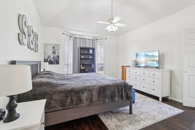 7314 Glenstone St, Rowlett, TX 75089 - bedroom with dark wood-type flooring, lofted ceiling, ceiling fan, and baseboards