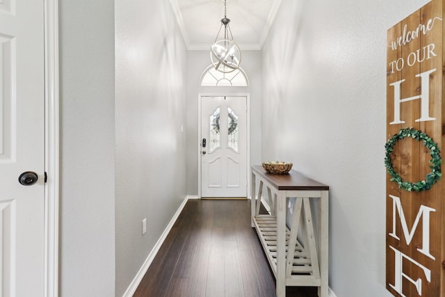7314 Glenstone St, Rowlett, TX 75089 - entrance foyer featuring ornamental molding, baseboards, and dark wood finished floors