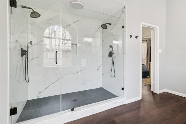 7314 Glenstone St, Rowlett, TX 75089 - full bath with a marble finish shower, wood finished floors, and baseboards