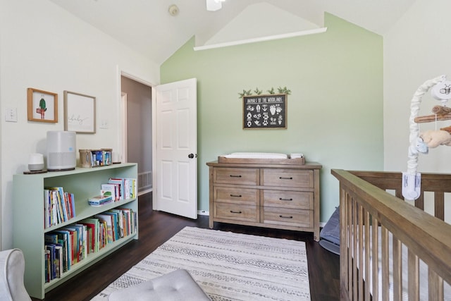 7314 Glenstone St, Rowlett, TX 75089 - bedroom featuring lofted ceiling, dark wood-style flooring, and a nursery area