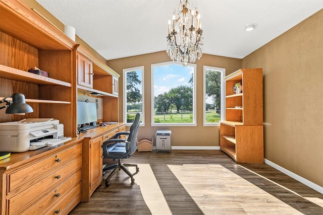 1200 Old Decatur Rd, Decatur, TX 76234 - office space featuring a chandelier, baseboards, and dark wood-type flooring