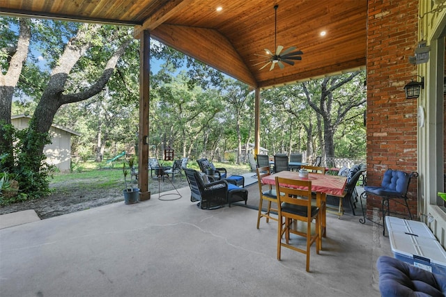 1200 Old Decatur Rd, Decatur, TX 76234 - view of patio with ceiling fan, outdoor lounge area, view of wooded area, and outdoor dining space