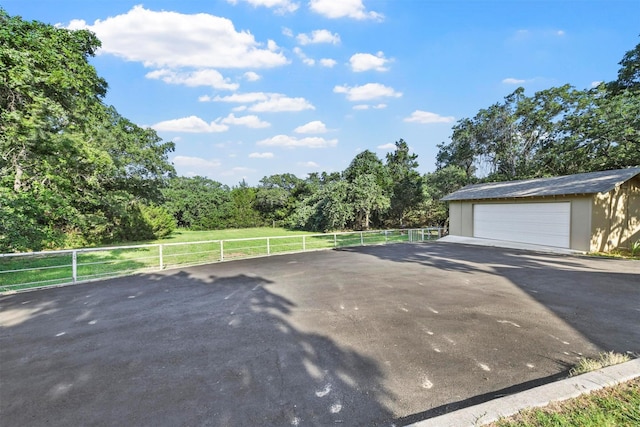 1200 Old Decatur Rd, Decatur, TX 76234 - view of patio / terrace featuring an outbuilding and a garage
