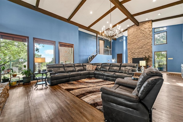 1200 Old Decatur Rd, Decatur, TX 76234 - living room with high vaulted ceiling, a chandelier, beam ceiling, wood finished floors, and stairway