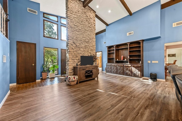 1200 Old Decatur Rd, Decatur, TX 76234 - living room featuring high vaulted ceiling, baseboards, wood finished floors, beamed ceiling, and a fireplace