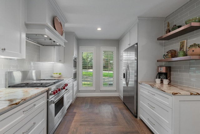 6867 Mossvine Dr, Dallas, TX 75254 - kitchen featuring stainless steel appliances, tasteful backsplash, recessed lighting, open shelves, and white cabinetry