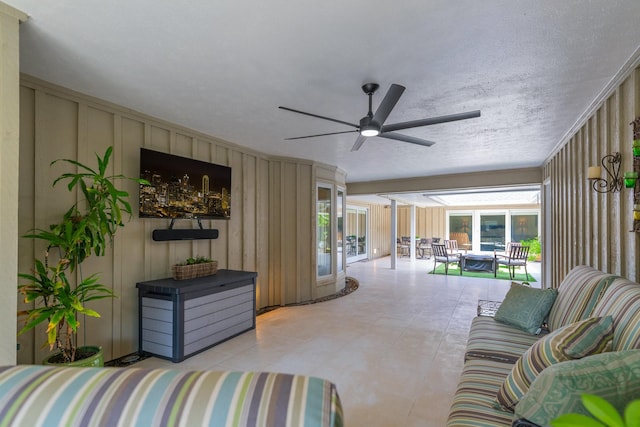 6867 Mossvine Dr, Dallas, TX 75254 - living room featuring ceiling fan