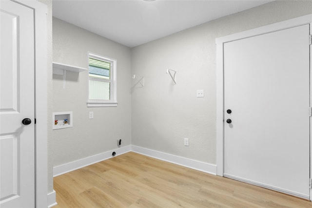 5305 Links Dr, Waco, TX 76708 - washroom featuring light wood-style floors, washer hookup, and baseboards