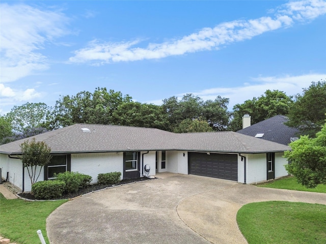 5305 Links Dr, Waco, TX 76708 - single story home with a garage, a front lawn, concrete driveway, a shingled roof, and a chimney