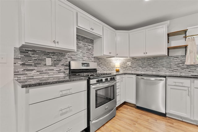 201 W Tinsley Dr, Robinson, TX 76706 - kitchen with appliances with stainless steel finishes, white cabinets, open shelves, light wood-style flooring, and decorative backsplash