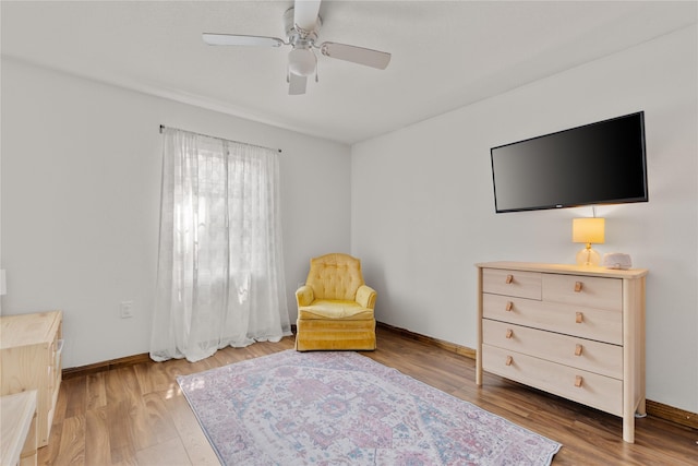 201 W Tinsley Dr, Robinson, TX 76706 - sitting room with a ceiling fan, baseboards, and wood finished floors
