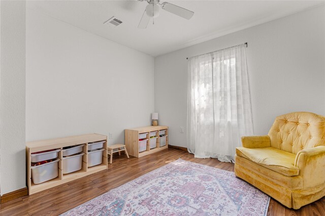 201 W Tinsley Dr, Robinson, TX 76706 - sitting room featuring a ceiling fan, wood finished floors, and baseboards