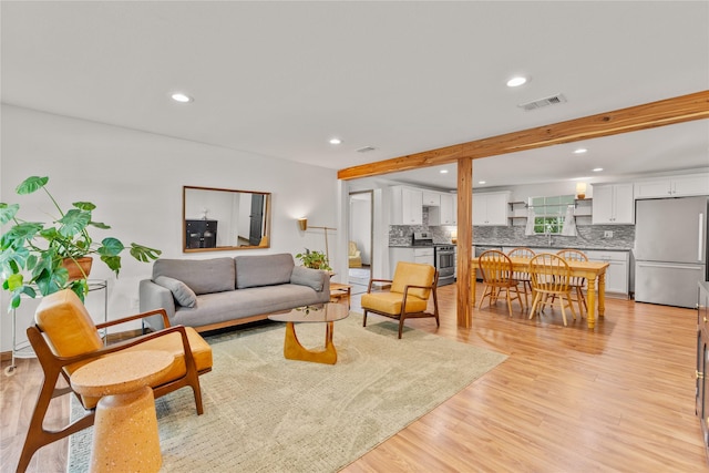 201 W Tinsley Dr, Robinson, TX 76706 - living area with light wood finished floors and recessed lighting