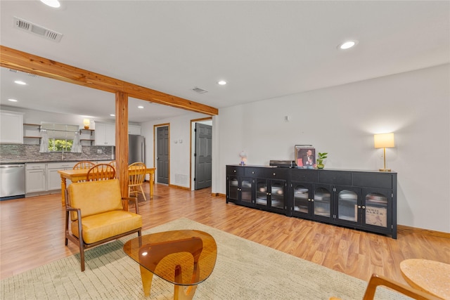 201 W Tinsley Dr, Robinson, TX 76706 - living area with light wood-type flooring, recessed lighting, baseboards, and beamed ceiling