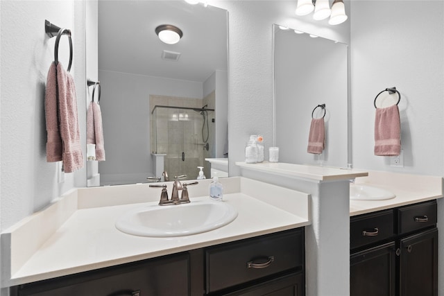 2014 Autumn Dr, Glenn Heights, TX 75154 - full bathroom featuring a stall shower and two vanities