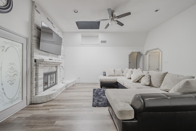 4612 Applewood Rd, Fort Worth, TX 76133 - living room with ceiling fan, a brick fireplace, wood finished floors, and recessed lighting