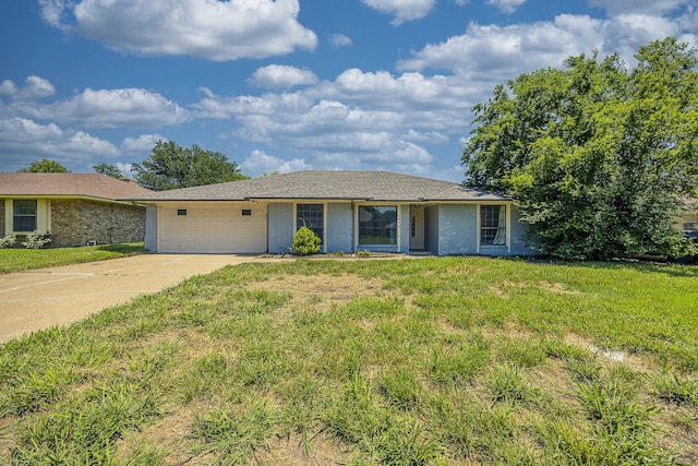 4612 Applewood Rd, Fort Worth, TX 76133 - ranch-style home featuring a garage, brick siding, driveway, and a front lawn