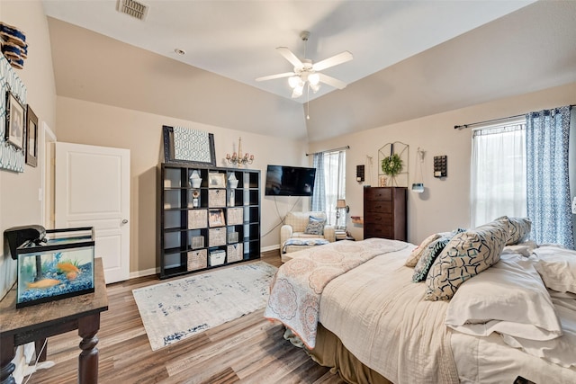 11808 Warbler Ln, Fort Worth, TX 76244 - bedroom featuring wood finished floors, baseboards, vaulted ceiling, and a ceiling fan
