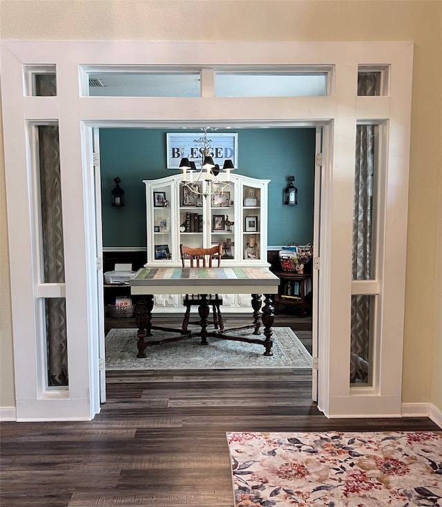 11808 Warbler Ln, Fort Worth, TX 76244 - dining area with dark wood finished floors and a chandelier