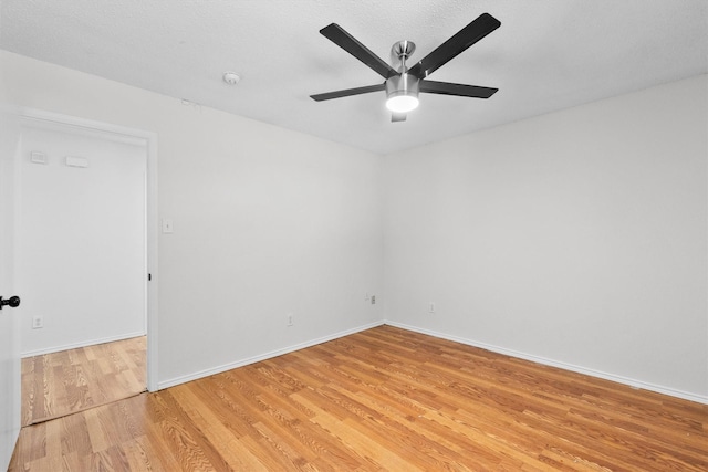 1800 Summer Glen Ct, Allen, TX 75002 - spare room featuring light wood-style flooring, ceiling fan, baseboards, and a smoke detector