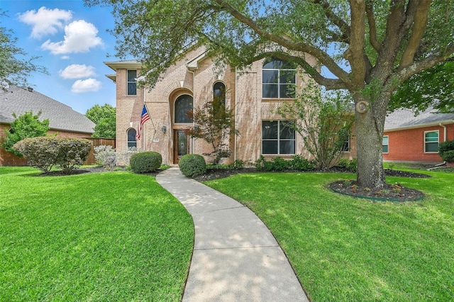 1408 Placer Dr, Allen, TX 75013 - traditional-style home with a front lawn and brick siding