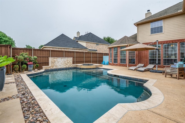 439 Fox Trl, Allen, TX 75002 - view of swimming pool featuring a fenced backyard, a patio, and a pool with connected hot tub