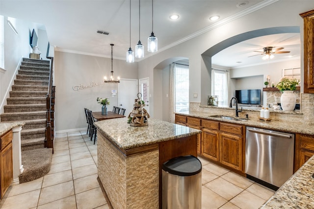 439 Fox Trl, Allen, TX 75002 - kitchen featuring dishwasher, a sink, brown cabinets, light tile patterned floors, and ceiling fan