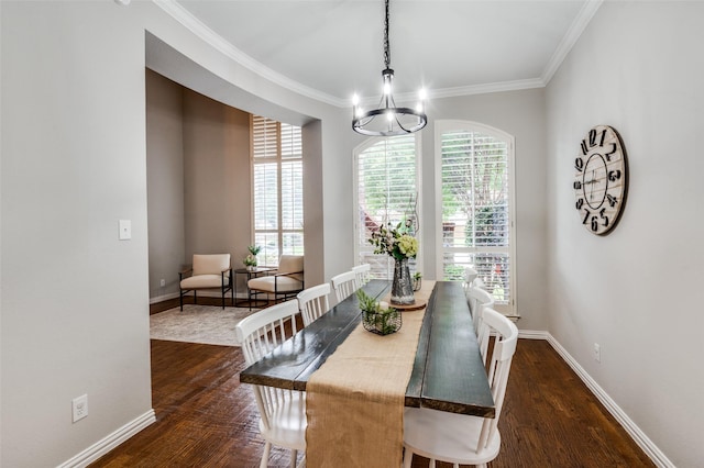 439 Fox Trl, Allen, TX 75002 - dining room with healthy amount of natural light, crown molding, dark wood finished floors, and a chandelier