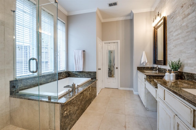 439 Fox Trl, Allen, TX 75002 - bathroom with healthy amount of natural light, a bath, double vanity, a shower stall, and crown molding