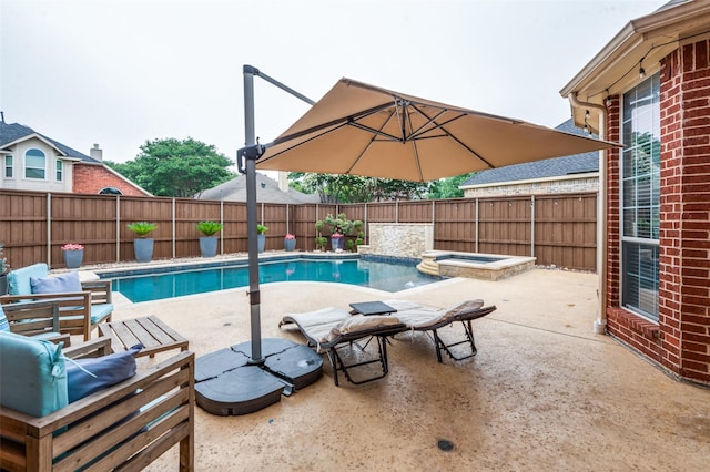439 Fox Trl, Allen, TX 75002 - view of swimming pool featuring a patio area, a fenced backyard, and a pool with connected hot tub