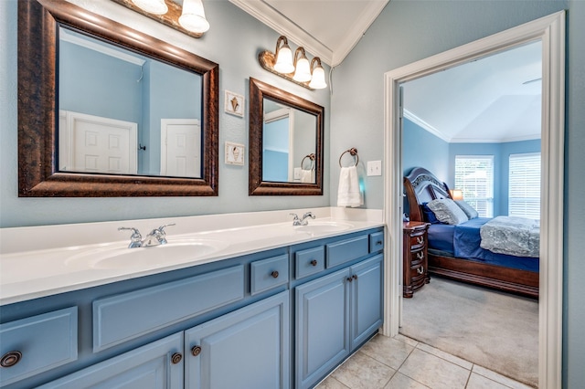 417 Fox Trl, Allen, TX 75002 - ensuite bathroom with crown molding, vaulted ceiling, double vanity, and tile patterned floors